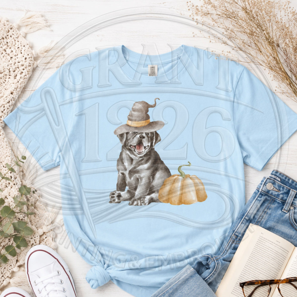 Chambray Comfort Colors short sleeve Halloween dog shirt flat lay with witch hat dog and pumpkin