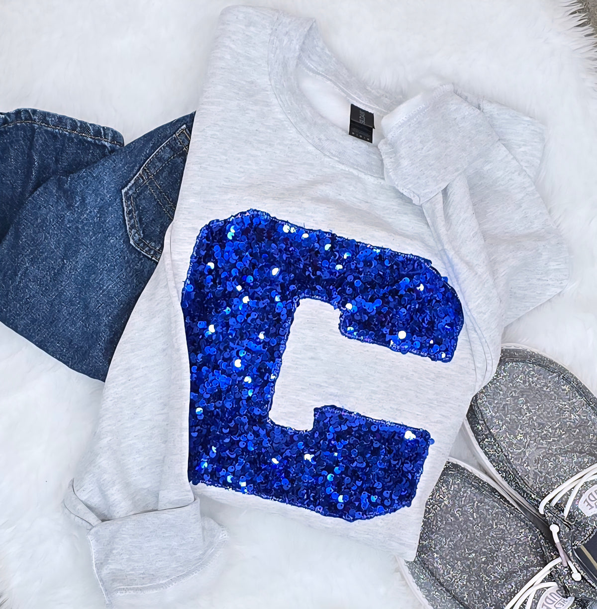 Custom sequin initial sweatshirt with blue sequin appliqué letter