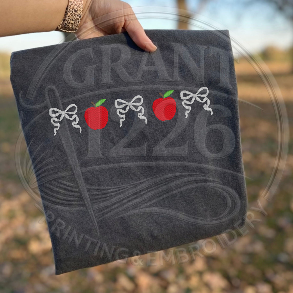 Cute embroidered teacher shirt with apple and bow design