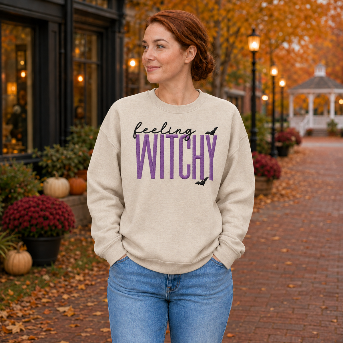 Woman wearing Sand Feeling Witchy embroidered Halloween sweatshirt