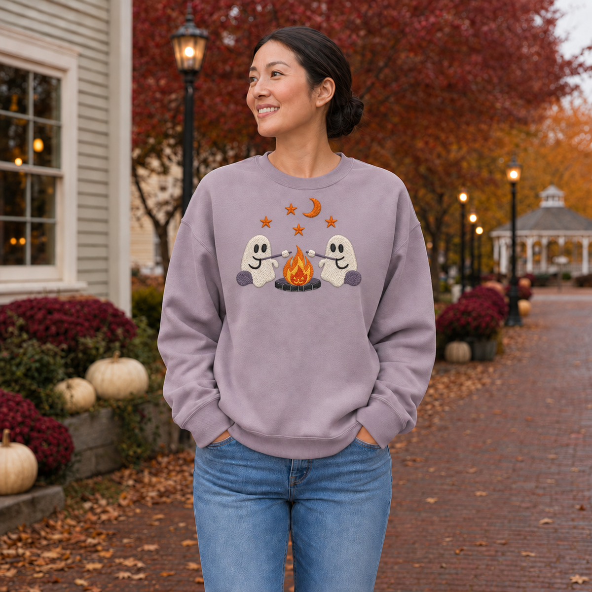 Adult wearing Paragon embroidered ghost campfire Halloween sweatshirt