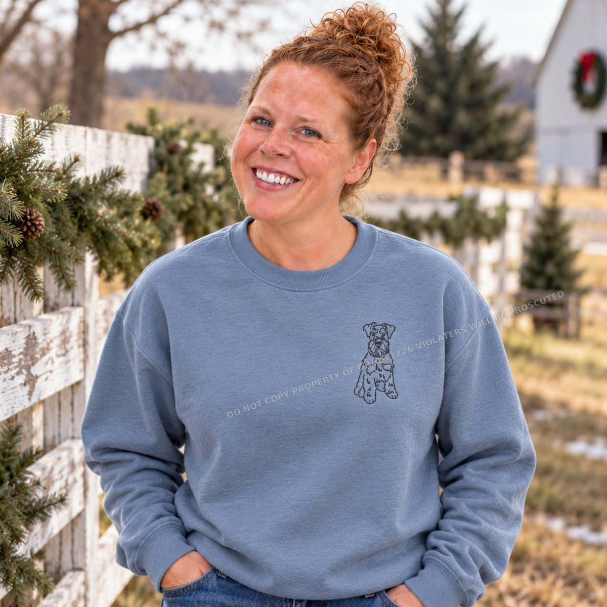 Schnauzer embroidered stone blue Gildan Softstyle sweatshirt on a farm