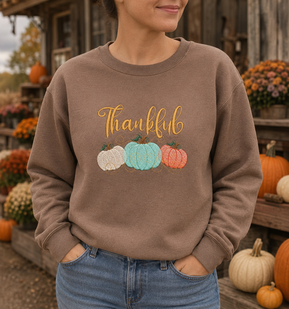 Thankful pumpkin embroidered Gildan Softstyle sweatshirt in Brown Savanna at a fall farmstand