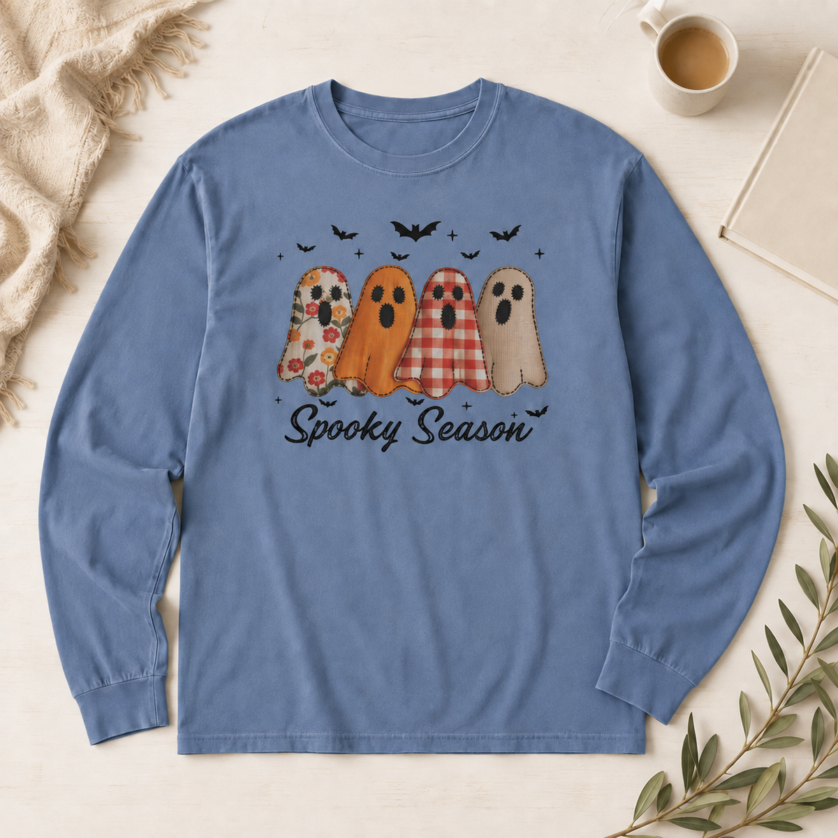 Blue Jean Comfort Colors 6014 long-sleeve shirt with four patterned ghosts and Spooky Season script.