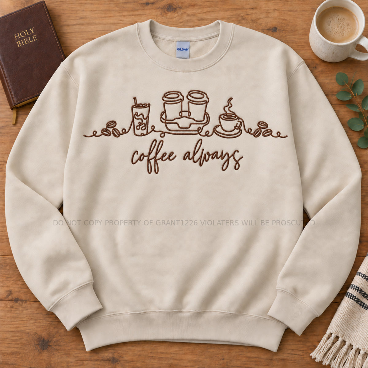 Sand Coffee Always embroidered Gildan Softstyle sweatshirt arranged completely flat with coffee styling