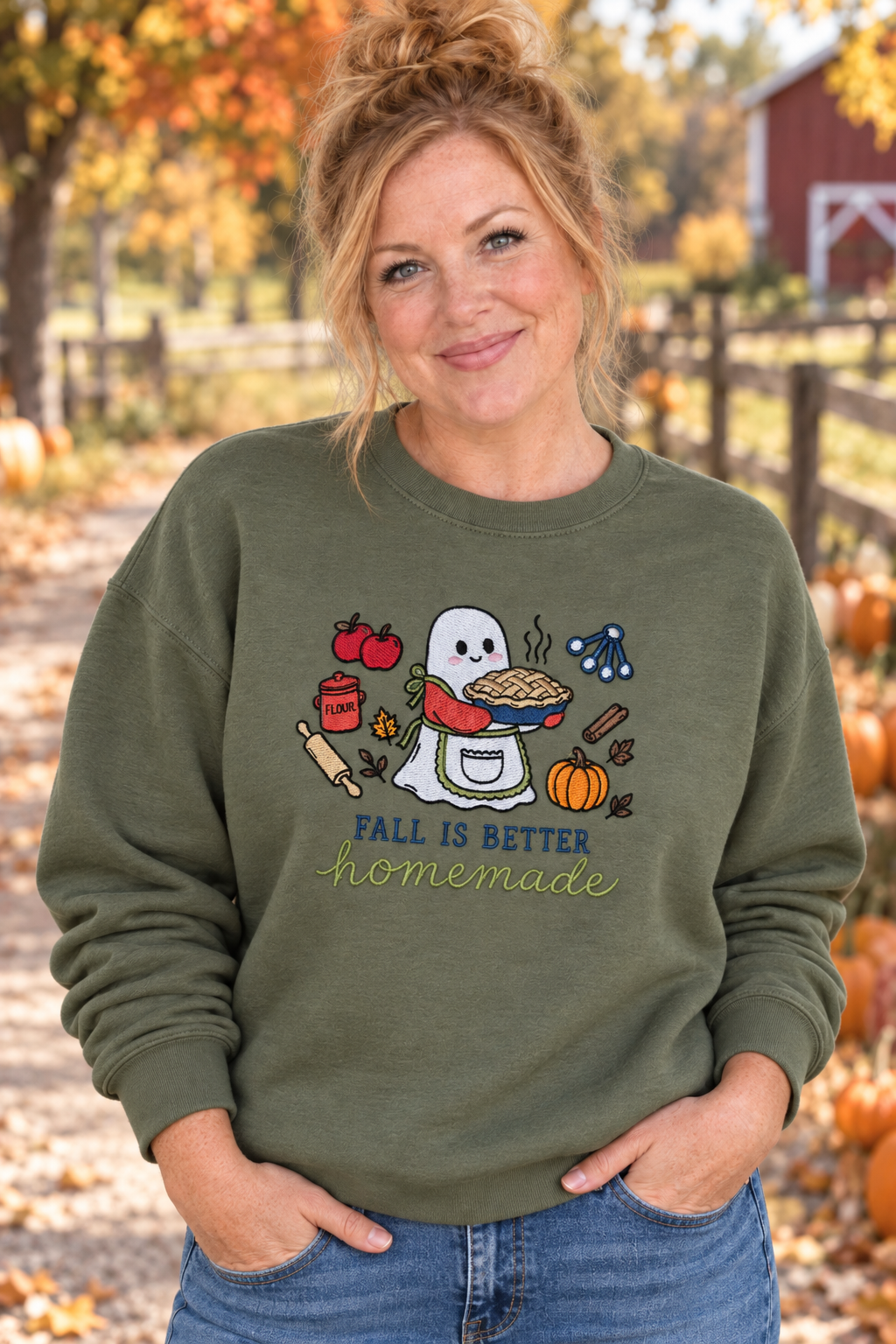 Woman wearing a Military Green Fall Is Better Homemade embroidered ghost baker sweatshirt