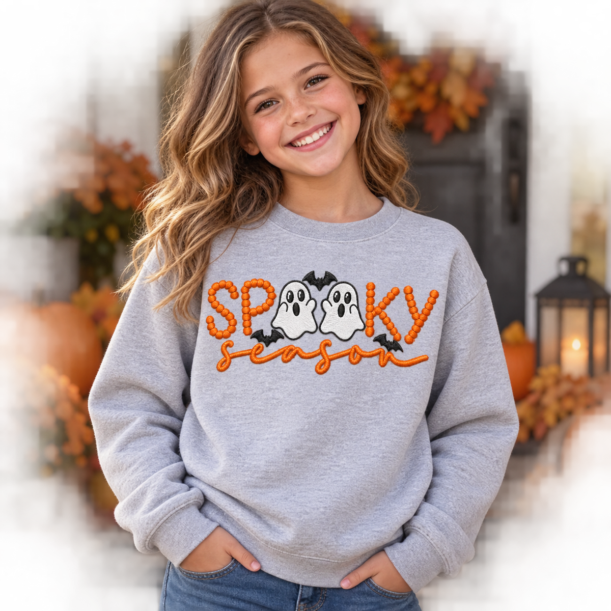 Youth sport grey ghost embroidered Halloween sweatshirt with orange Spooky Season design