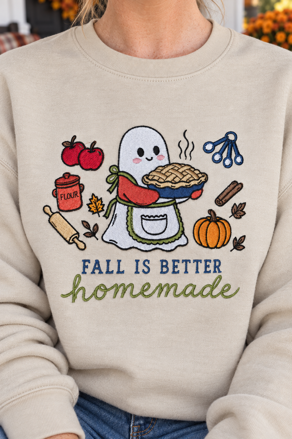 Close detail of the 5 by 7 inch Fall Is Better Homemade embroidered ghost baker design
