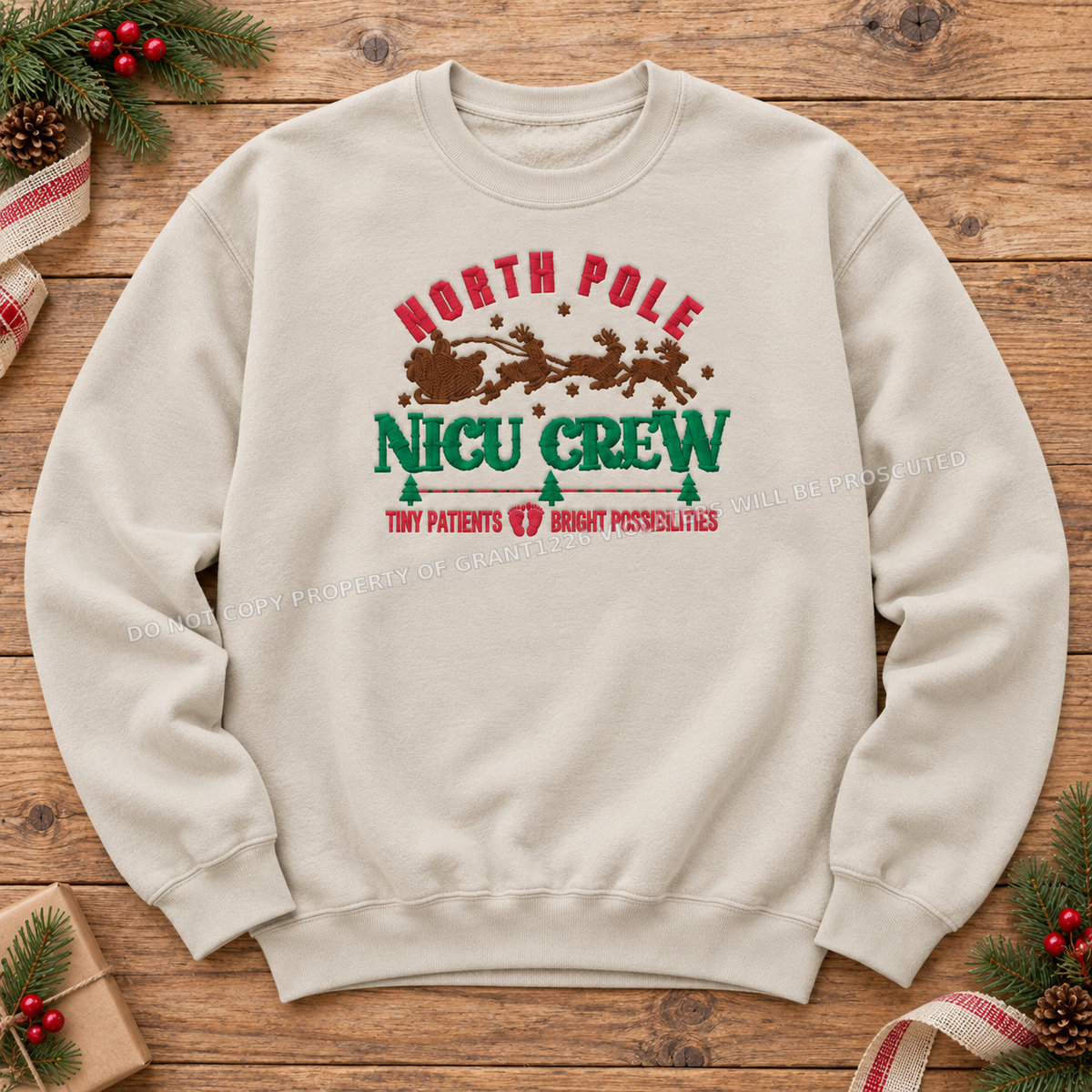 Sand North Pole NICU Crew embroidered sweatshirt flat lay