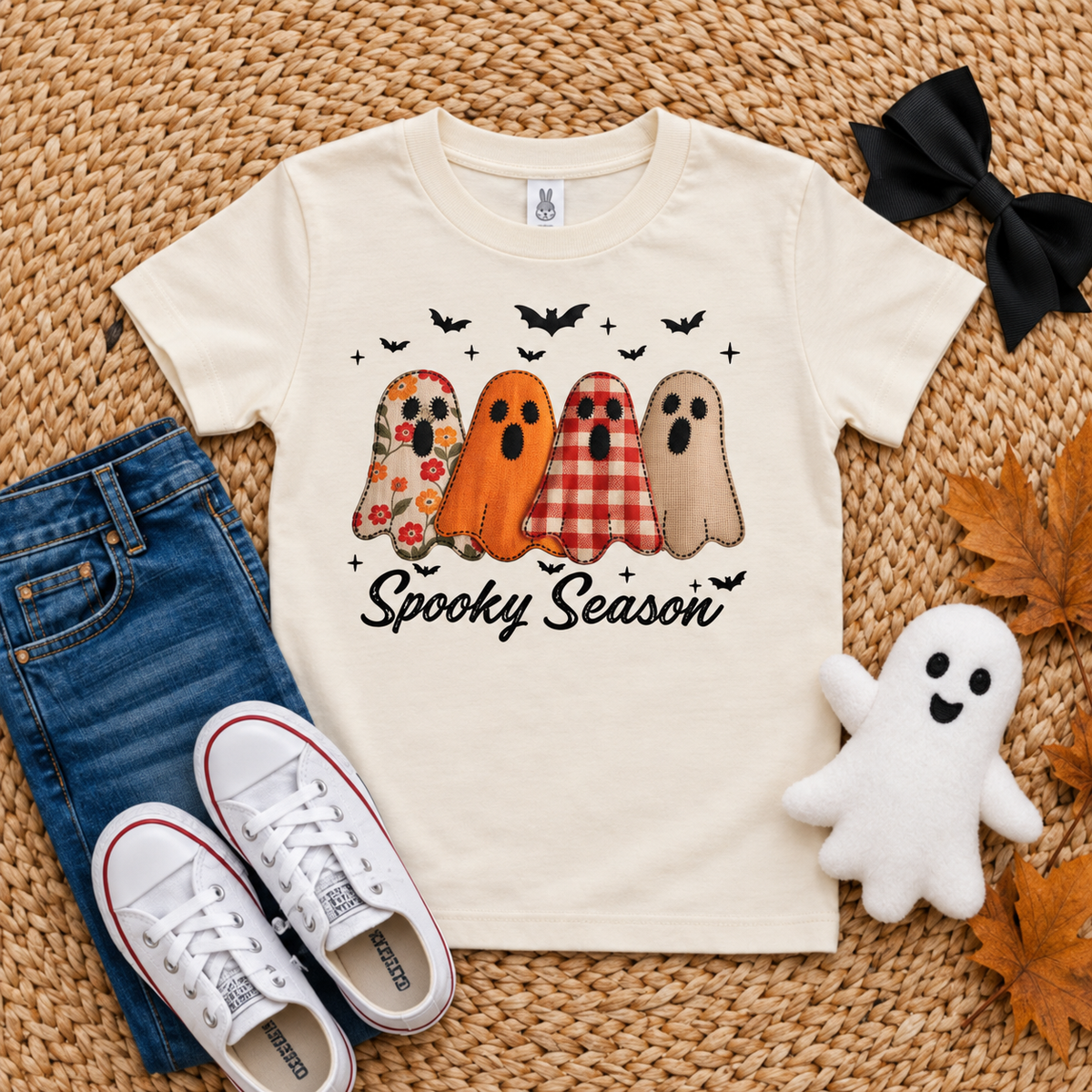 Ivory Rabbit Skins toddler Halloween shirt featuring four patterned ghosts, bats and Spooky Season script.