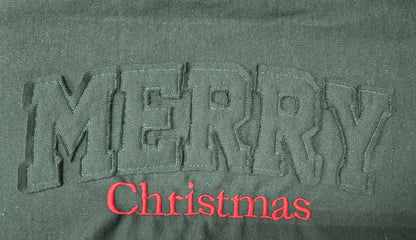 Close-up of frayed raggy applique Christmas embroidery detail