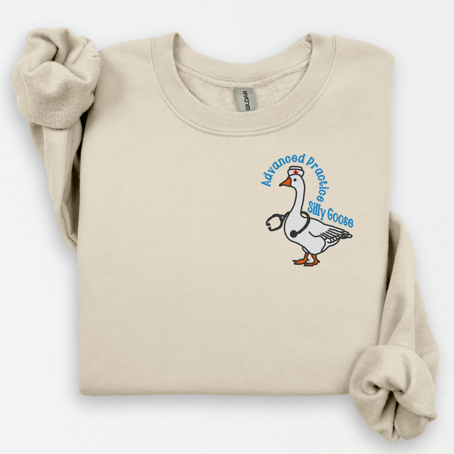 APRN Silly Goose embroidered crewneck sweatshirt flat lay view Sand