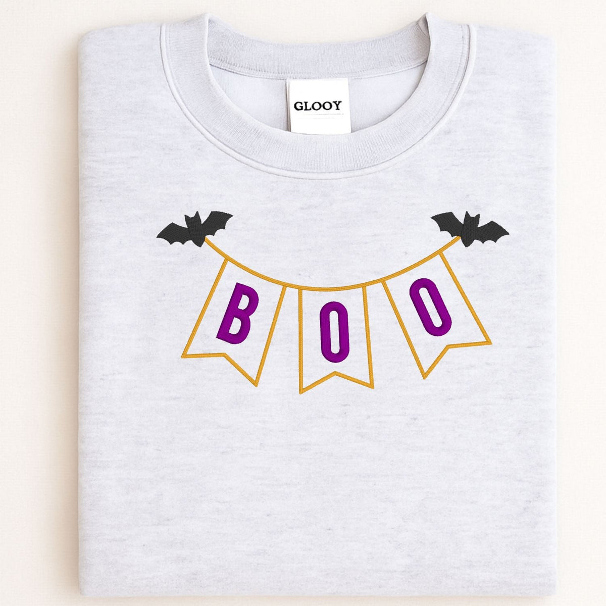 Ash BOO banner applique embroidered Halloween sweatshirt flat lay