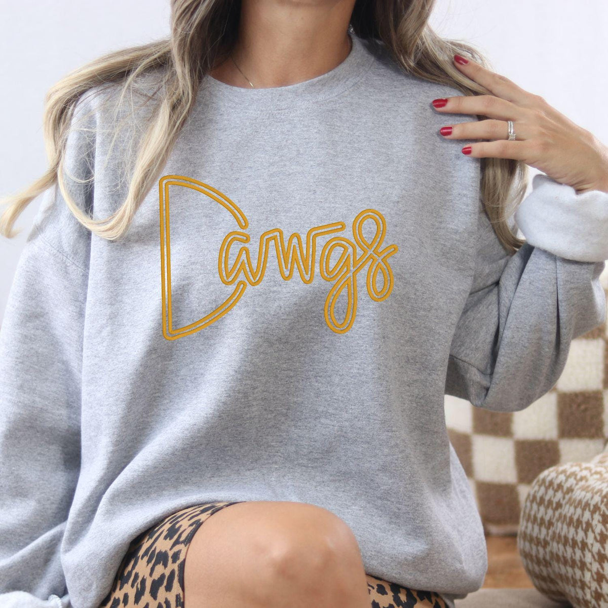 Ash Dawgs puff embroidered crewneck styled as a game day outfit