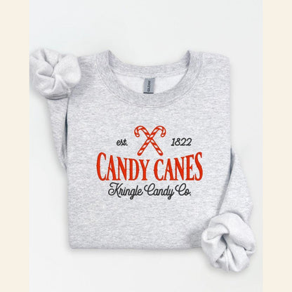 Ash embroidered Candy Cane Kringle Candy Co Christmas sweatshirt flat lay