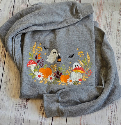 Ash floral ghost pumpkin and mushroom embroidered Halloween sweatshirt real product photo