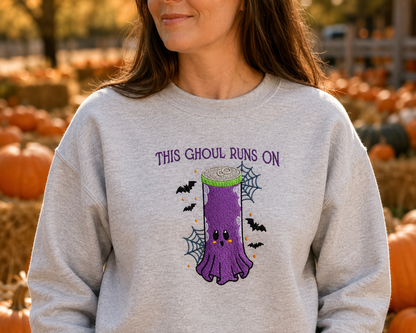 Ash ghost energy drink embroidered sweatshirt worn at a pumpkin patch
