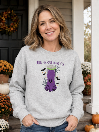 Ash ghost energy drink Halloween sweatshirt worn on a fall porch