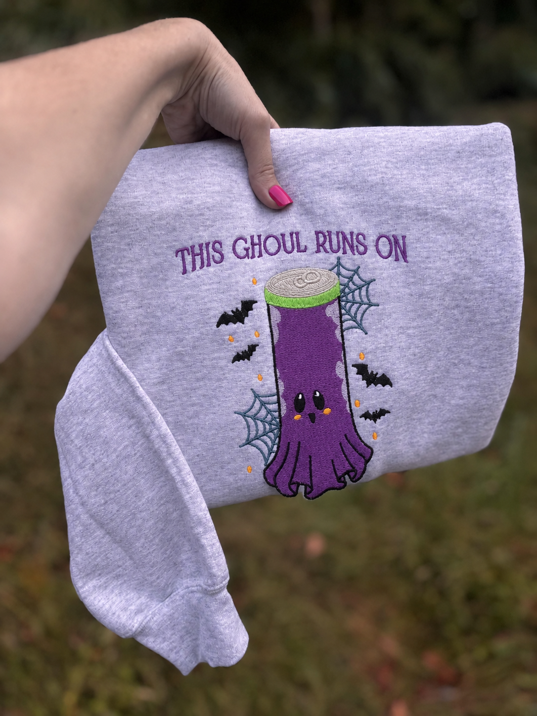 Folded Ash This Ghoul Runs On embroidered sweatshirt outdoor view