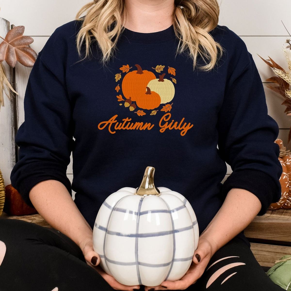 Navy Autumn Girly embroidered sweatshirt styled with a white pumpkin