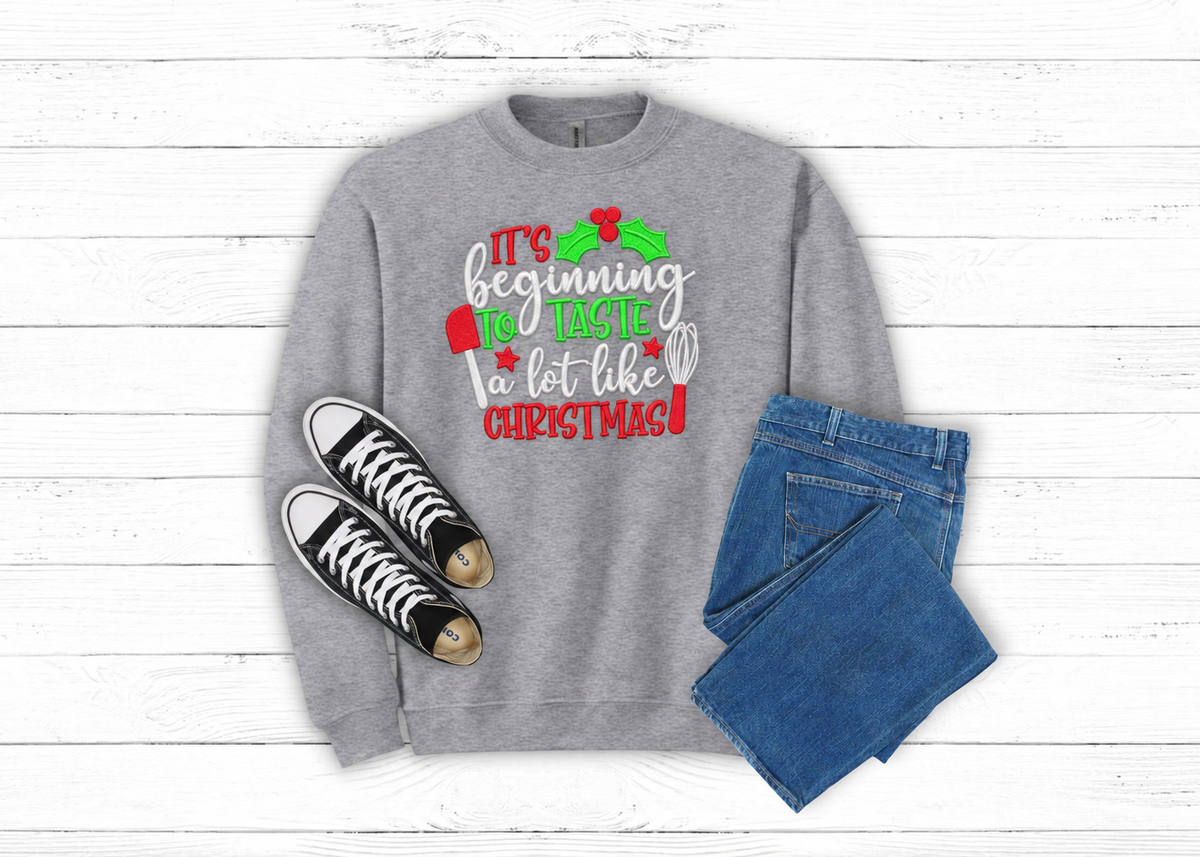 Sport Grey Beginning to Taste Like Christmas embroidered sweatshirt flat lay