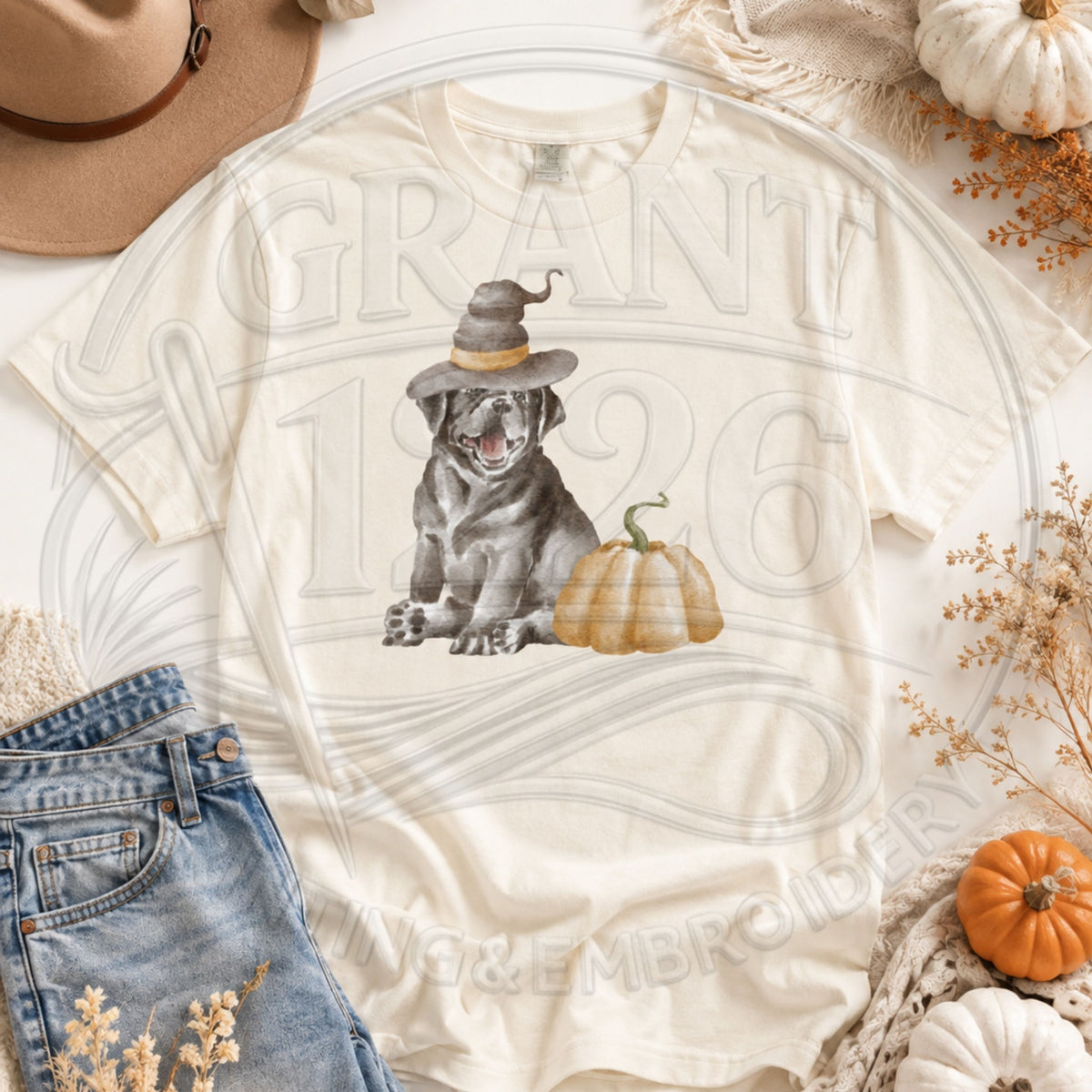 Ivory Comfort Colors short sleeve Halloween dog shirt flat lay with witch hat dog and pumpkin