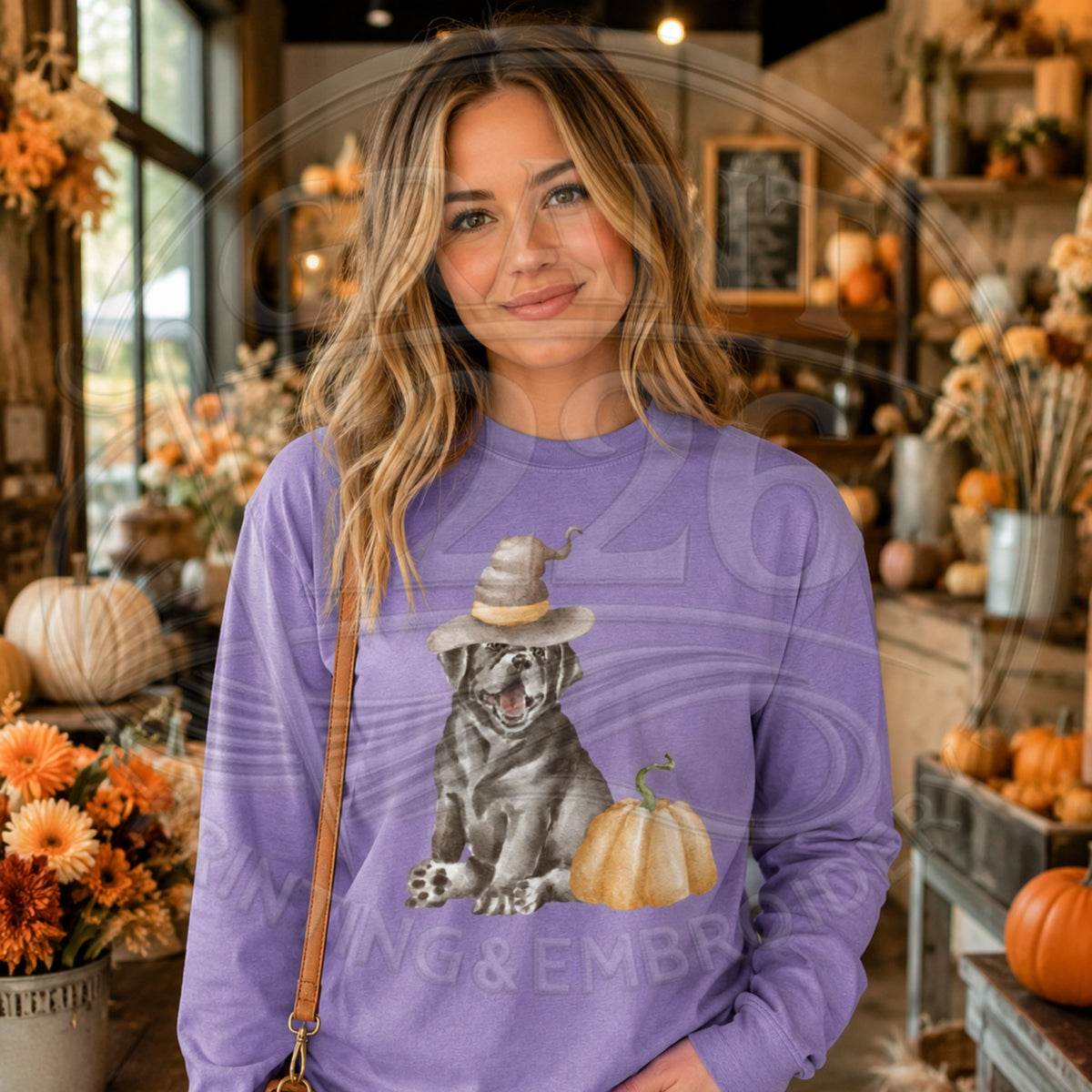 Violet Comfort Colors long sleeve shirt with a black dog in a witch hat beside a pumpkin