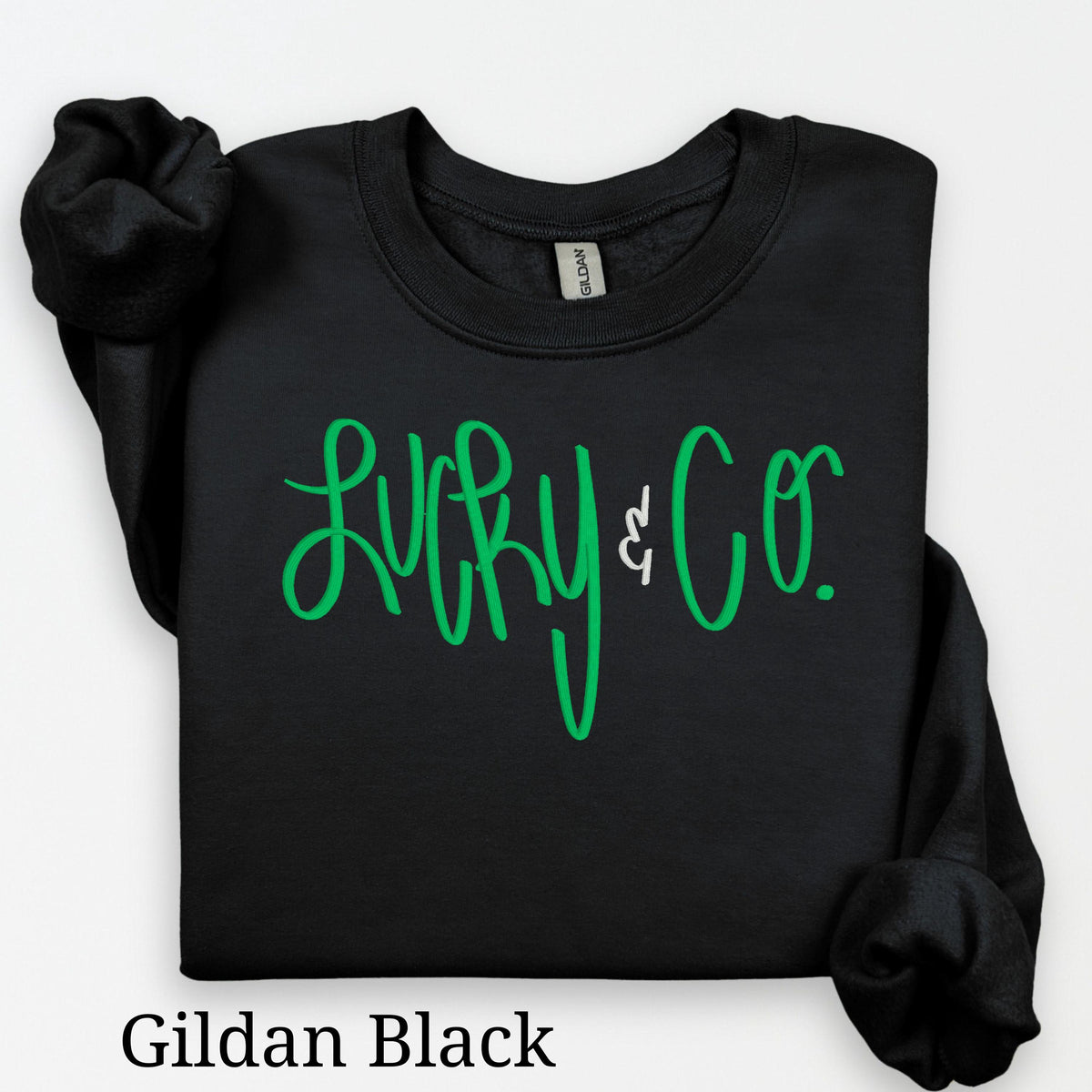 black St. Patrick’s Day crewneck with embroidered shamrock design