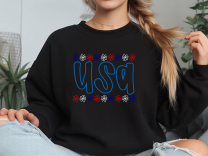 Black Gildan USA embroidered crewneck with red, white, and blue daisy borders