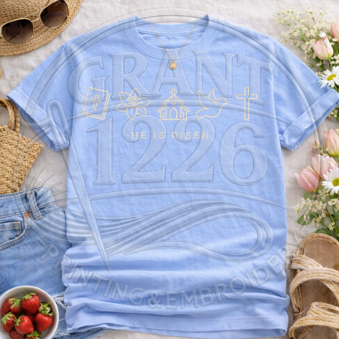 Chambray blue Christian Easter t shirt featuring He Is Risen pastel icon artwork on Comfort Colors tee
