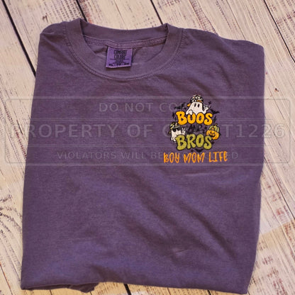 Actual Boos and Bros boy mom Halloween embroidery on a Grape Comfort Colors short sleeve shirt