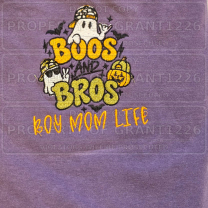 Close-up of Boos and Bros ghost and pumpkin embroidery with Boy Mom Life wording on Grape