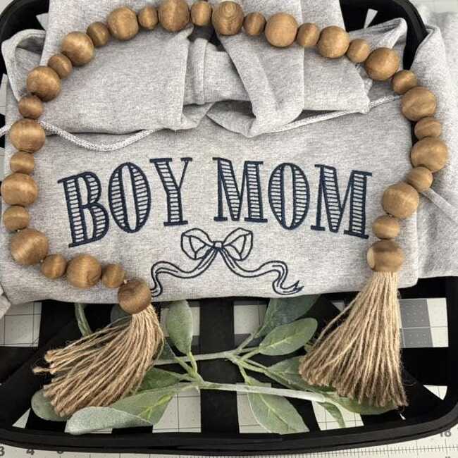 Finished Boy Mom embroidered sweatshirt with collegiate lettering and bow on Sport Grey fleece