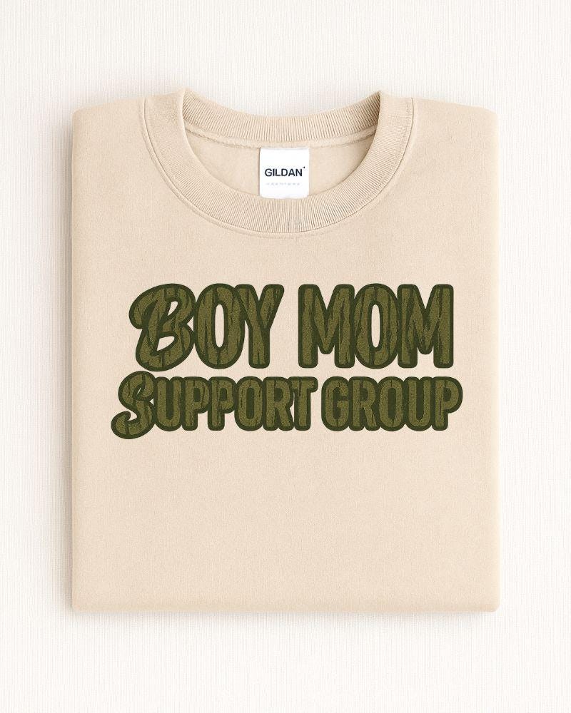 Folded sand Boy Mom Support Group graphic crewneck