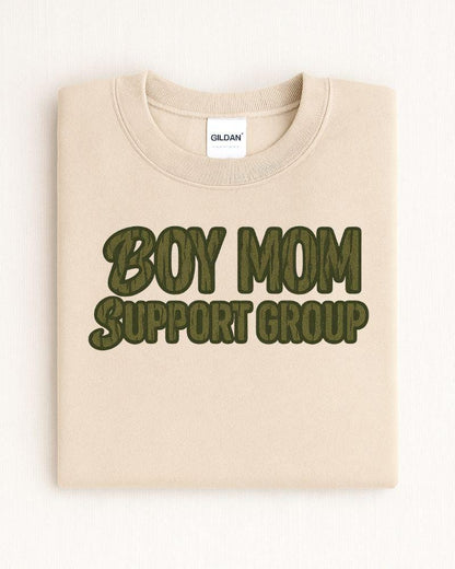 Folded sand Boy Mom Support Group graphic crewneck
