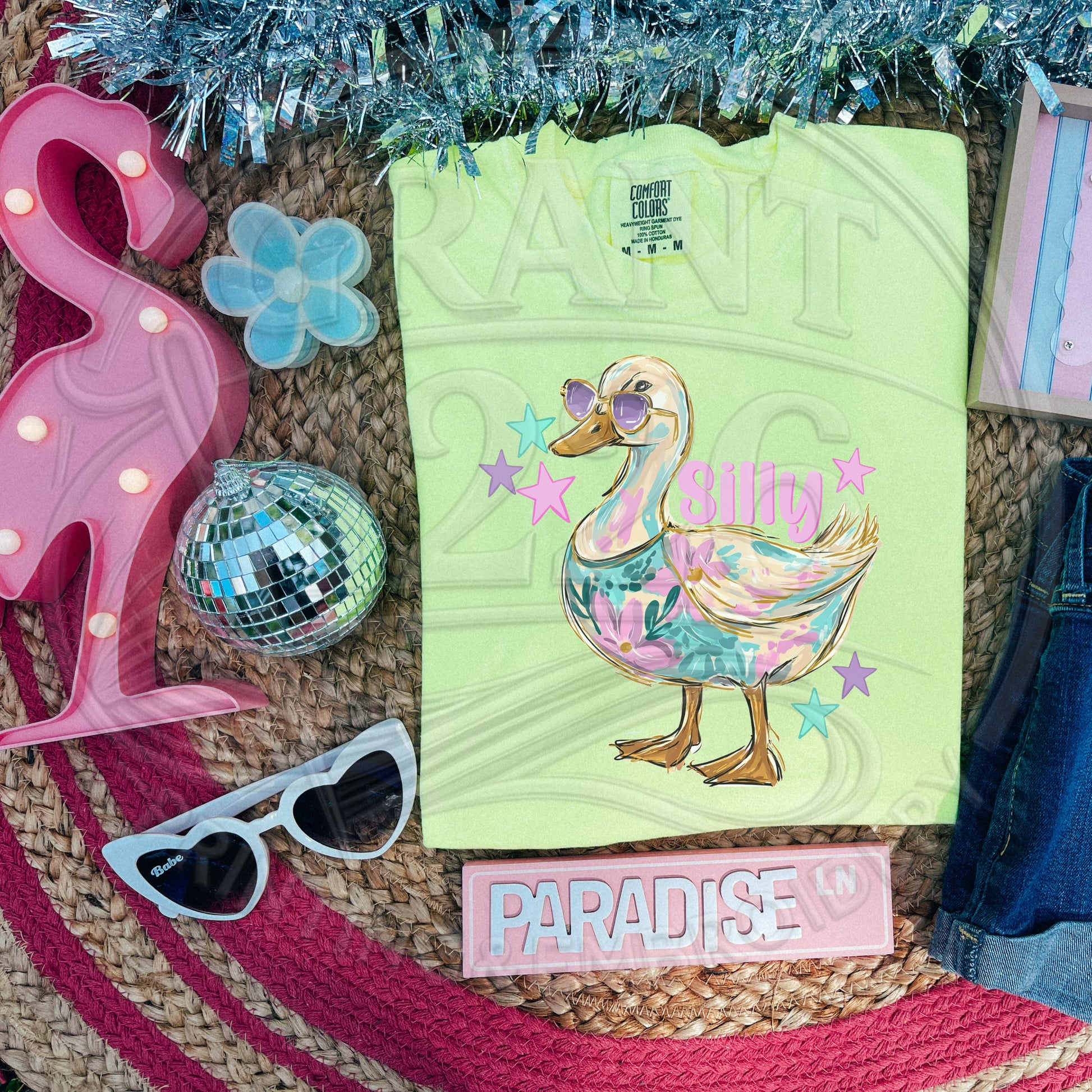Neon lemon Silly Goose graphic shirt with pastel goose artwork and sunglasses