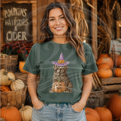 Brown dog in purple witch hat with jack-o-lantern on Comfort Colors Blue Spruce short-sleeve Halloween shirt