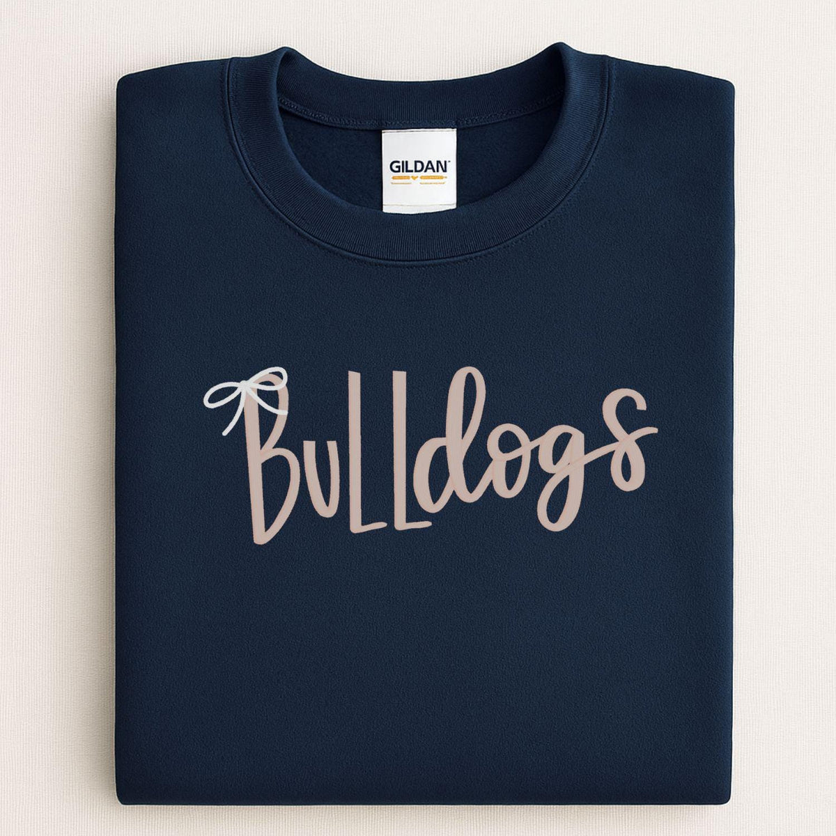 Navy Bulldogs script sweatshirt with bow embroidery folded for a front view