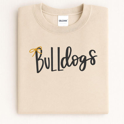 Sand Bulldogs embroidered crewneck folded on a light background