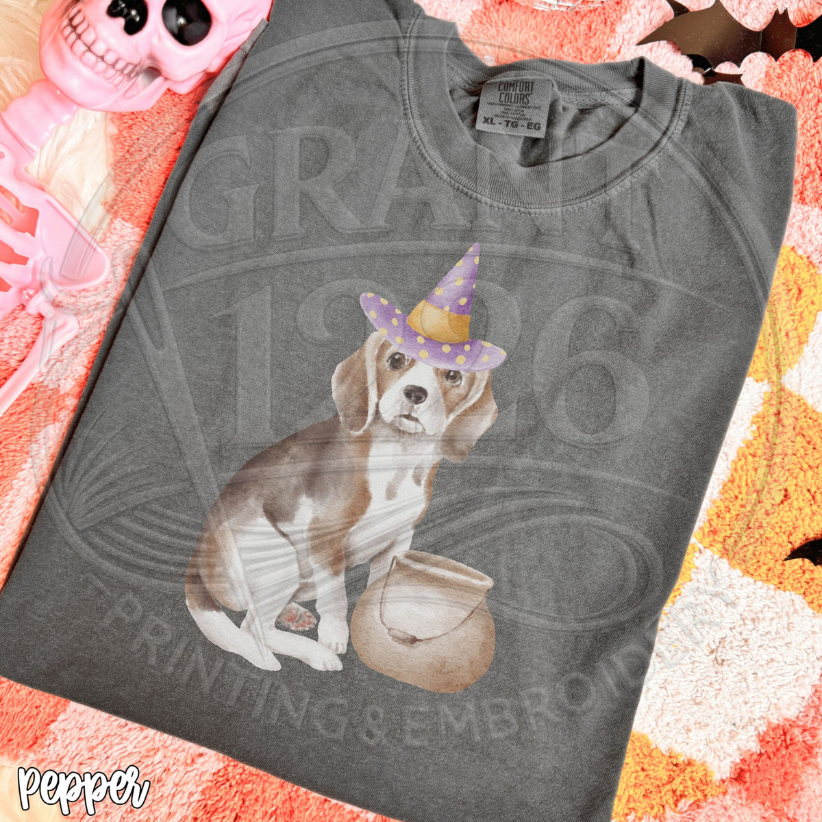 Pepper beagle witch Halloween shirt folded flat lay