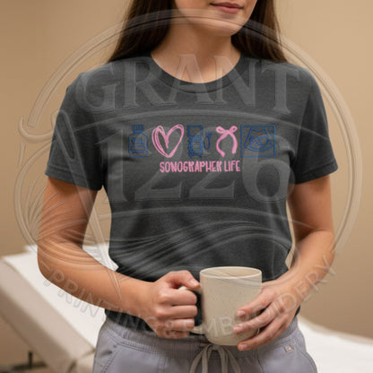 Charcoal ultrasound tech embroidered shirt styled with an iced coffee