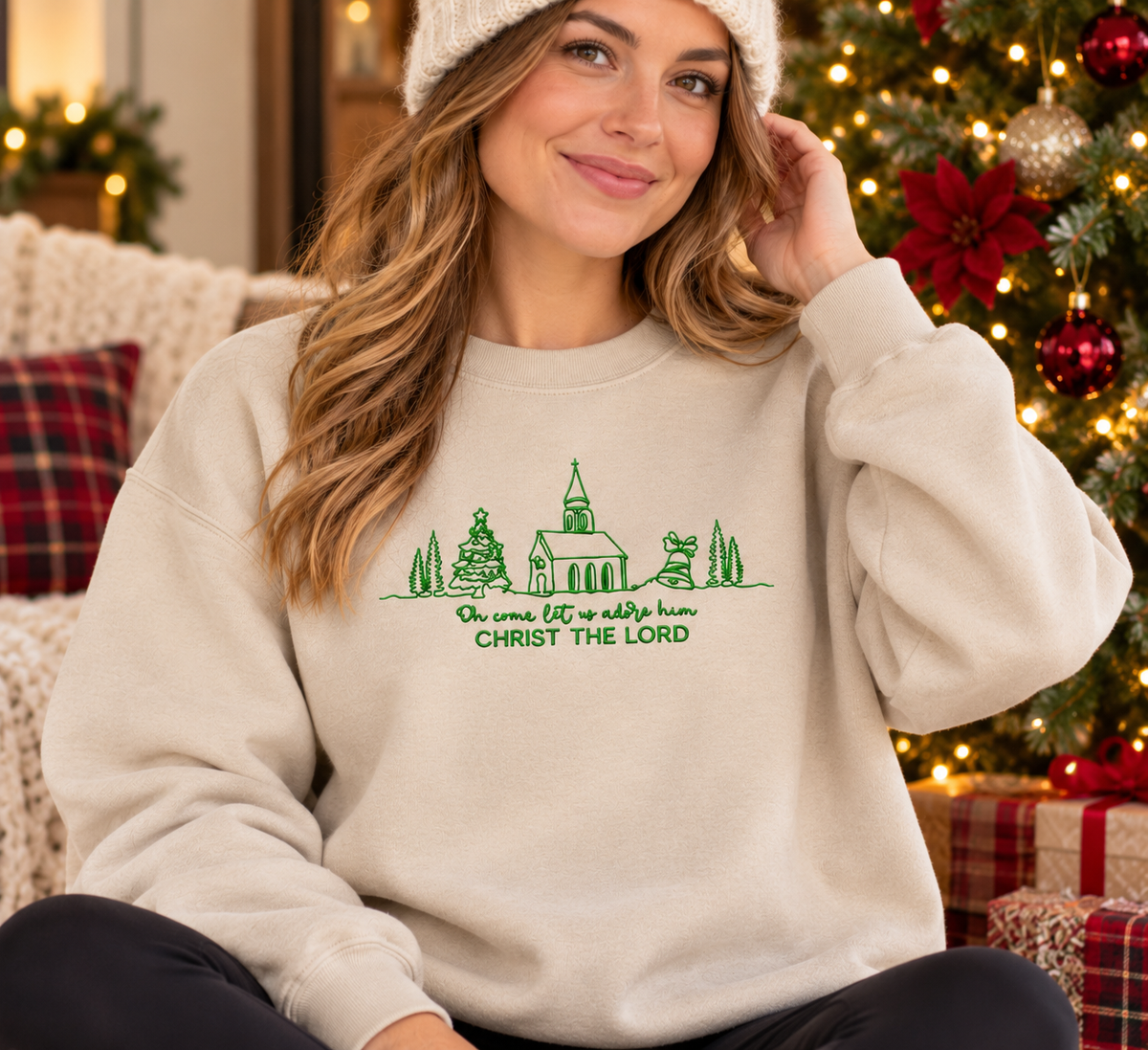 Sand Christ the Lord embroidered church and trees sweatshirt hanging by fireplace