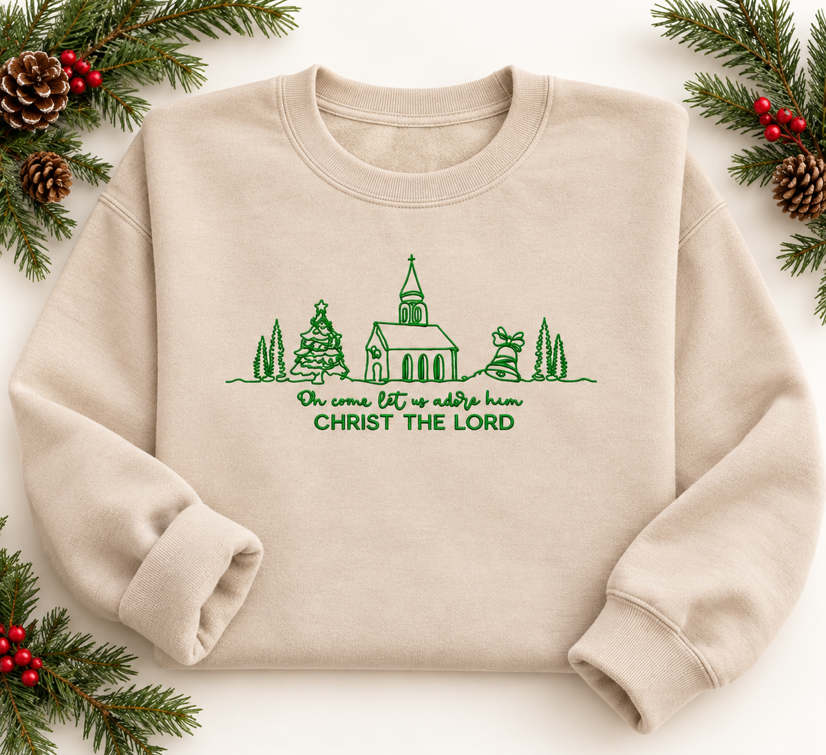 Sand Christ the Lord embroidered Christmas sweatshirt in snowy evergreen setting