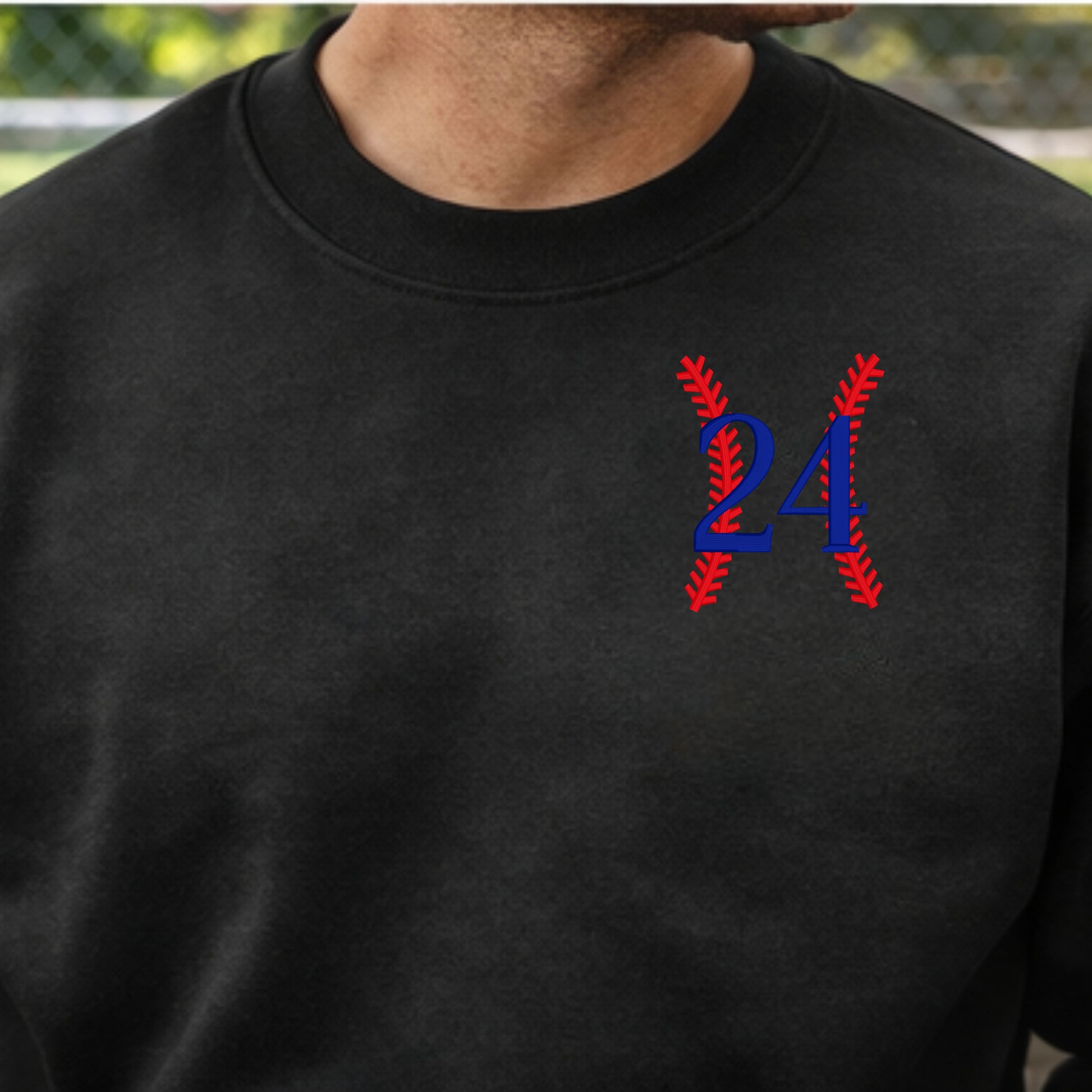 Custom baseball player number embroidered sweatshirt styled for game day