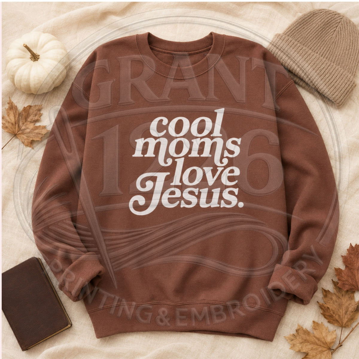 Cocoa Cool Moms Love Jesus Gildan Softstyle crewneck flat lay