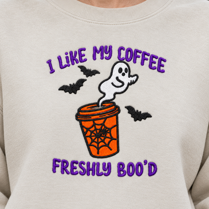 Close detail of I Like My Coffee Freshly Boo'd embroidery on Sand
