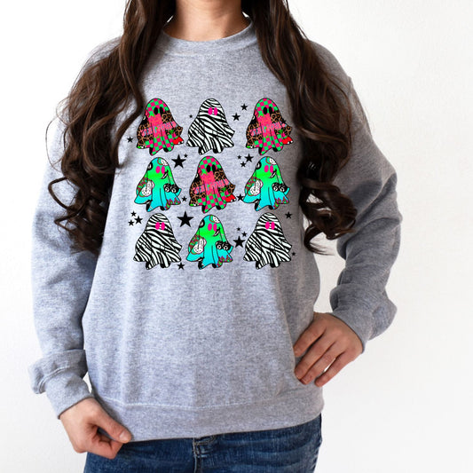 Colorful ghost pattern Halloween sweatshirt on a gray Gildan crewneck