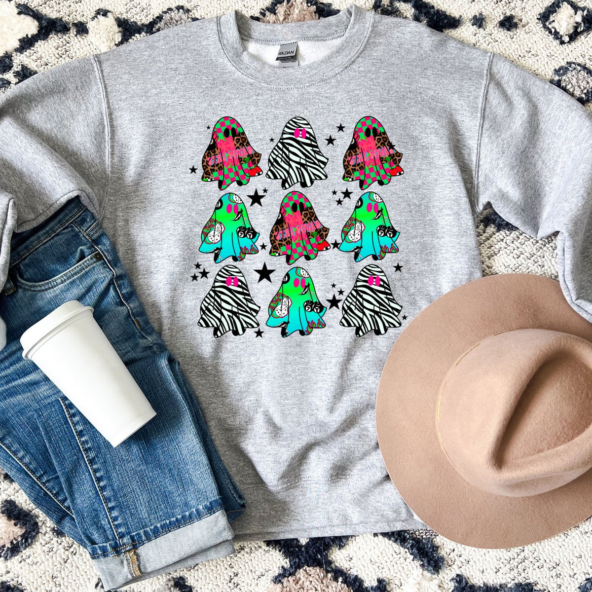 Colorful ghost Halloween crewneck with bright star accents