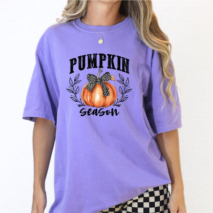 Comfort Colors 1717 Orchid autumn shirt featuring a Pumpkin Season bow design.