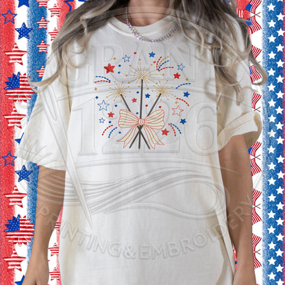 Ivory Comfort Colors patriotic T-shirt with embroidered fireworks bow design